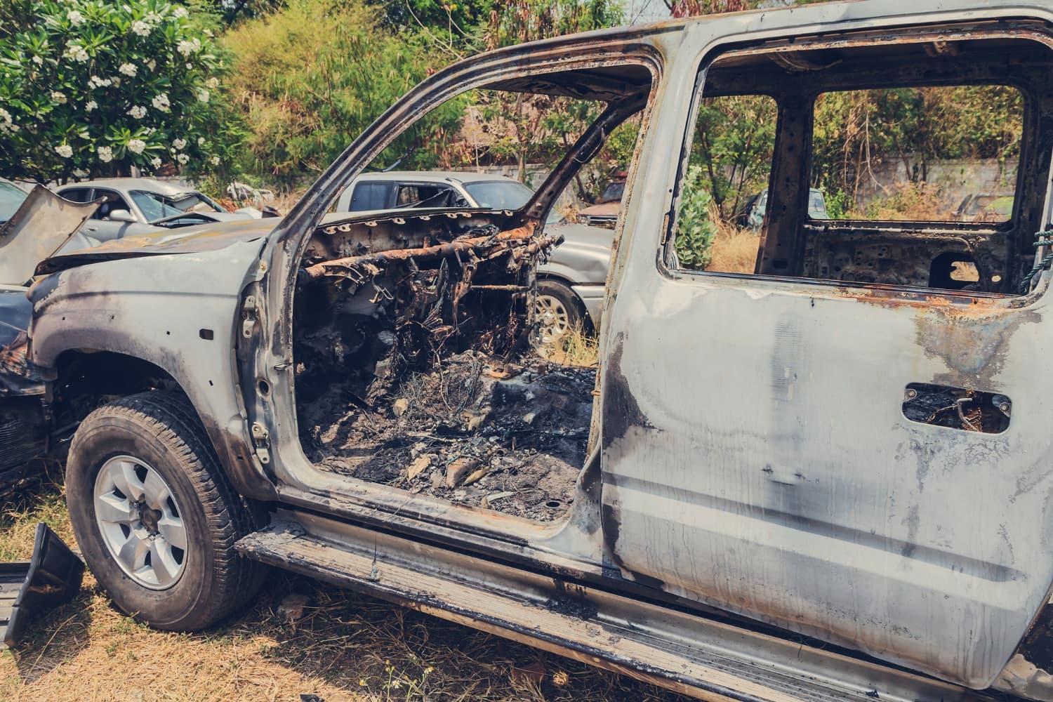 Fire-damaged pickup truck with a burned-out interior